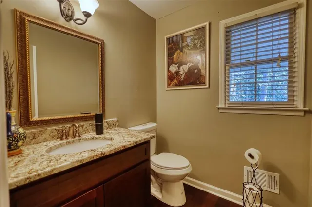 a bedroom with a bed and a table