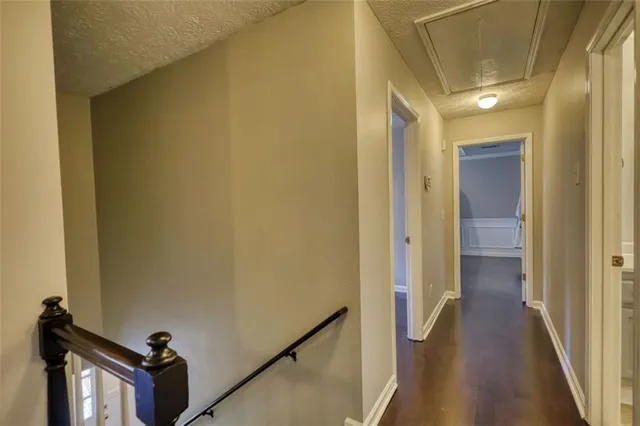 a bathroom with a sink a mirror and a toilet