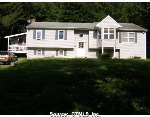 126 North Windham Road Windham, CT 06256 - Photo 1 of 1 a front view of a house with a yard