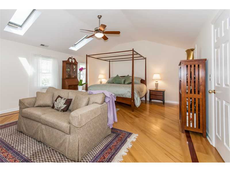 65 Lockwood Lane Riverside, CT 06878 - Photo 12 of 25 a living room with furniture and a flat screen tv
