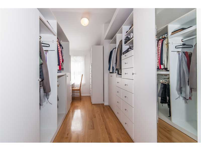 65 Lockwood Lane Riverside, CT 06878 - Photo 15 of 25 a view of walk in closet with clothes