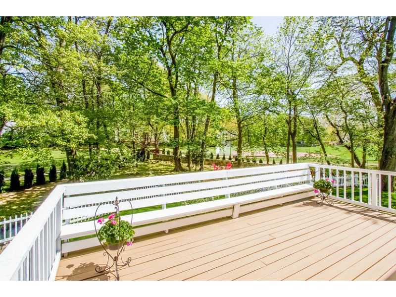 65 Lockwood Lane Riverside, CT 06878 - Photo 22 of 25 a view of outdoor space swimming pool and green space