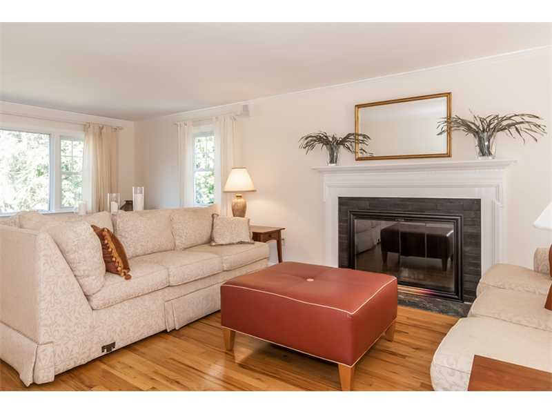 65 Lockwood Lane Riverside, CT 06878 - Photo 5 of 25 a living room with furniture and a fireplace