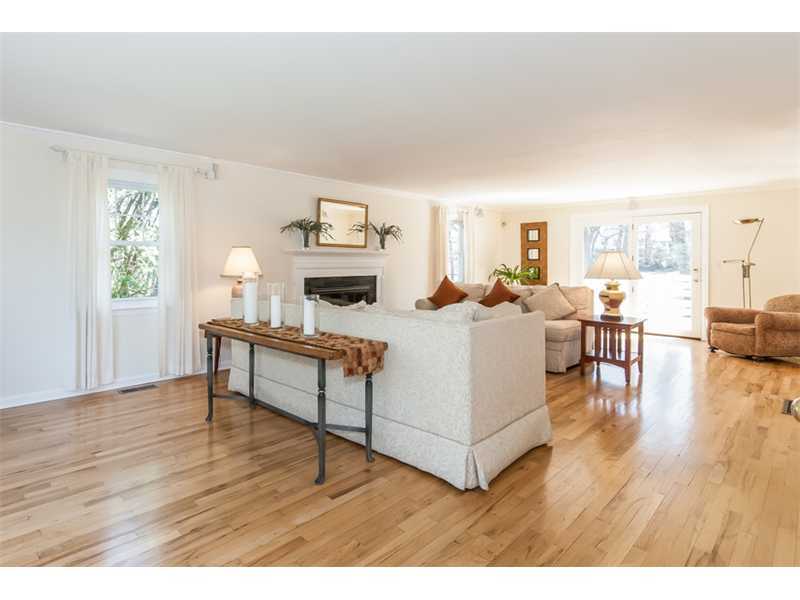 65 Lockwood Lane Riverside, CT 06878 - Photo 6 of 25 a living room with furniture and a wooden floor