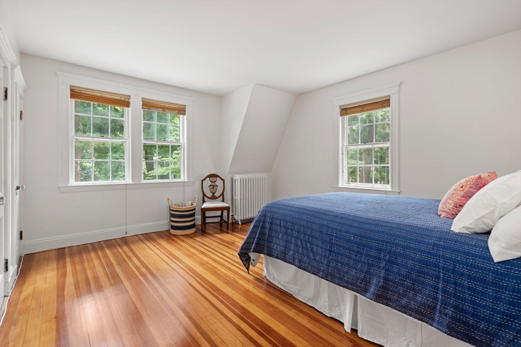 81 Avalon Road Newton, MA 02468 - Photo 19 of 38 a bedroom with a bed and a window
