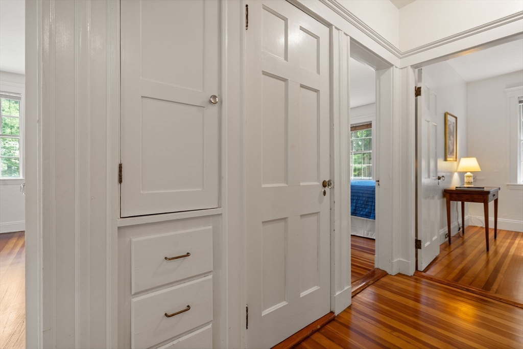 81 Avalon Road Newton, MA 02468 - Photo 20 of 38 a view of a livingroom with wooden floor and bathroom view