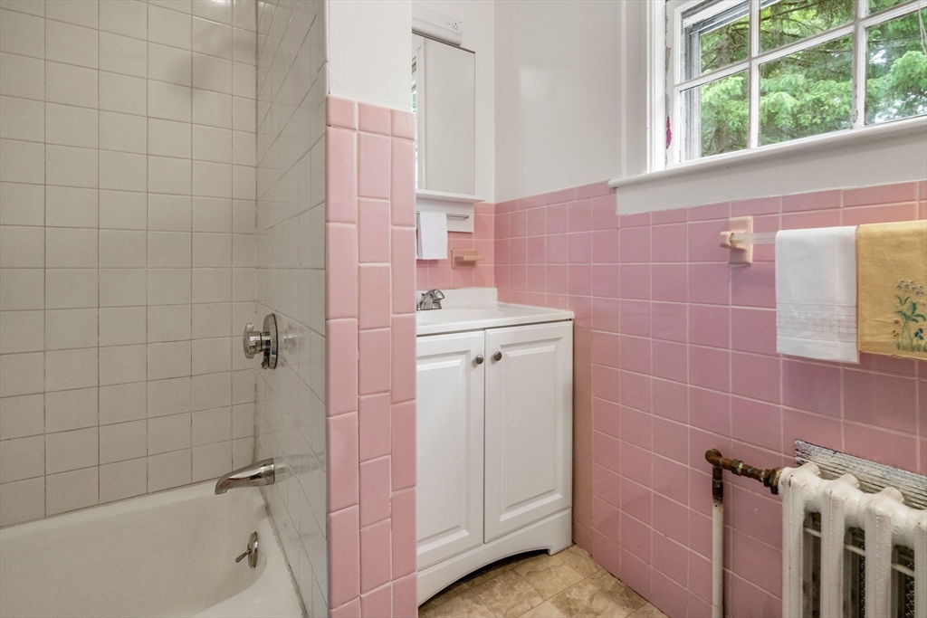 81 Avalon Road Newton, MA 02468 - Photo 24 of 38 a bathroom with a sink a toilet and shower
