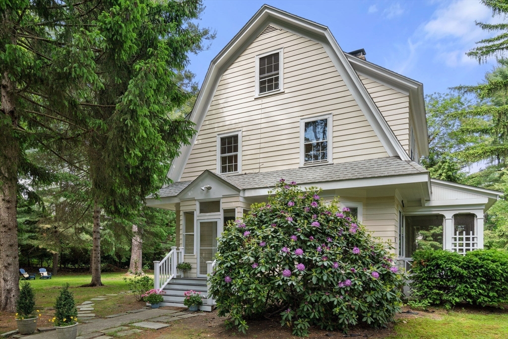 81 Avalon Road Newton, MA 02468 - Photo 28 of 38 a view of a house with a yard and potted plants