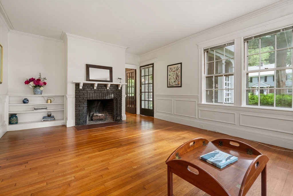 81 Avalon Road Newton, MA 02468 - Photo 6 of 38 a living room with furniture and a fireplace