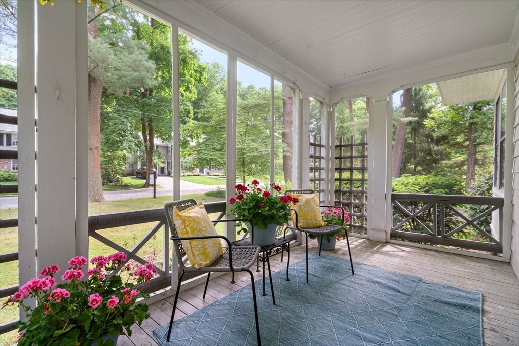 81 Avalon Road Newton, MA 02468 - Photo 8 of 38 a living room filled with furniture and a potted plant
