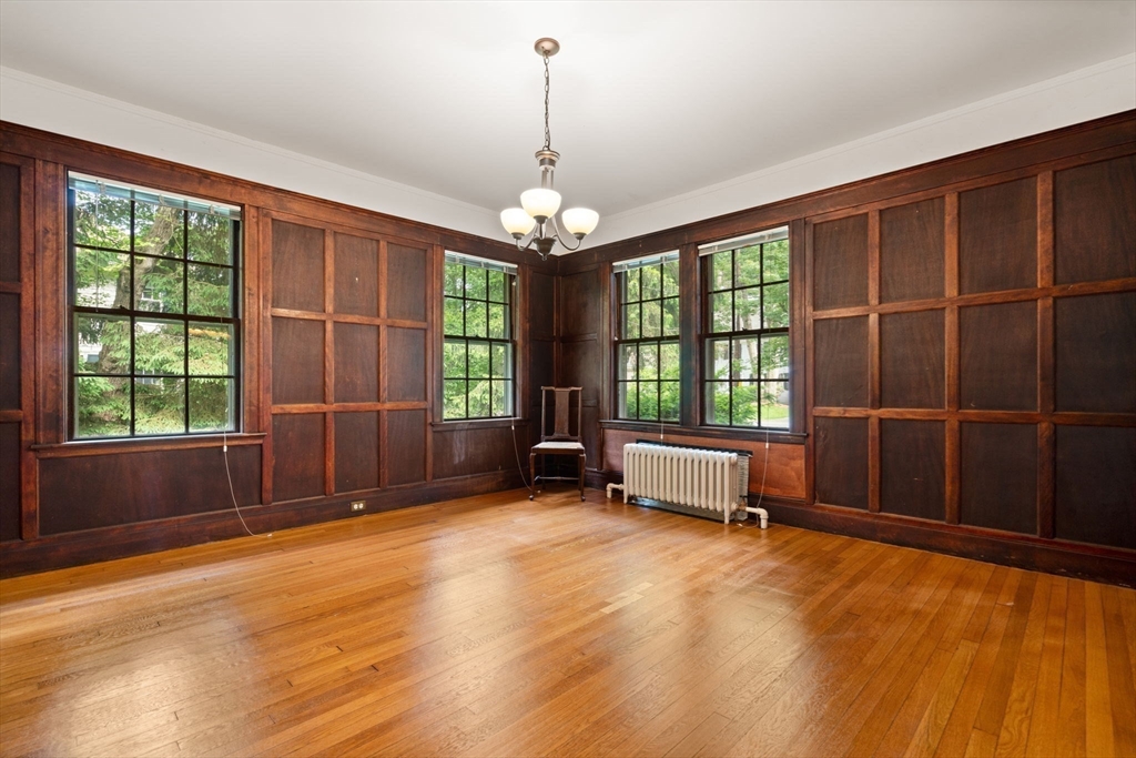 81 Avalon Road Newton, MA 02468 - Photo 9 of 38 a view of an empty room with wooden floor and a window