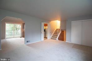 Spacious, light-filled living area.