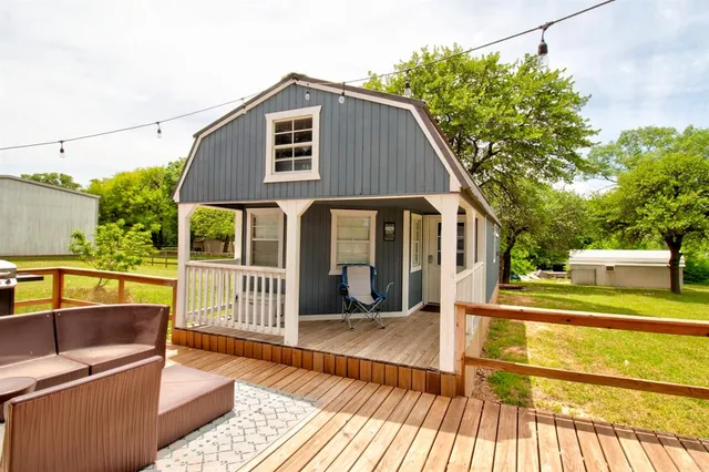 a front view of a house with a patio