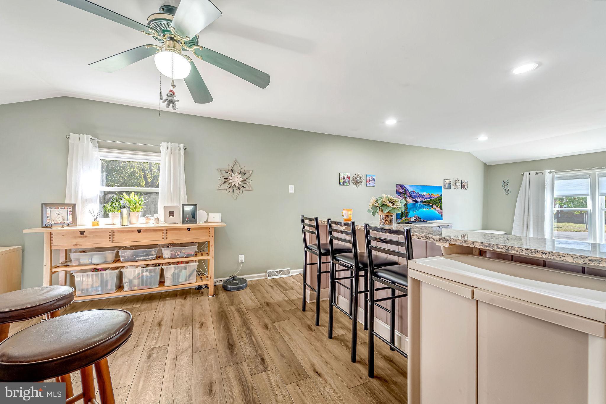 301 North Coles Avenue Maple Shade, NJ 08052 - Photo 16 of 31 a view of a dining room with furniture and wooden floor