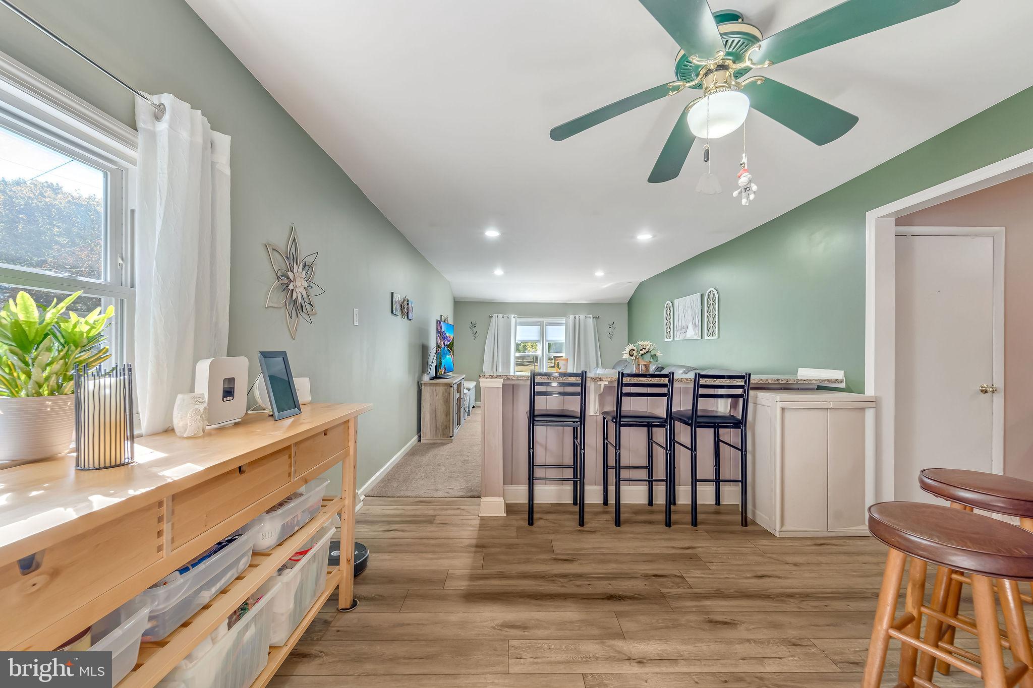 301 North Coles Avenue Maple Shade, NJ 08052 - Photo 17 of 31 a view of a kitchen with dining table and chairs
