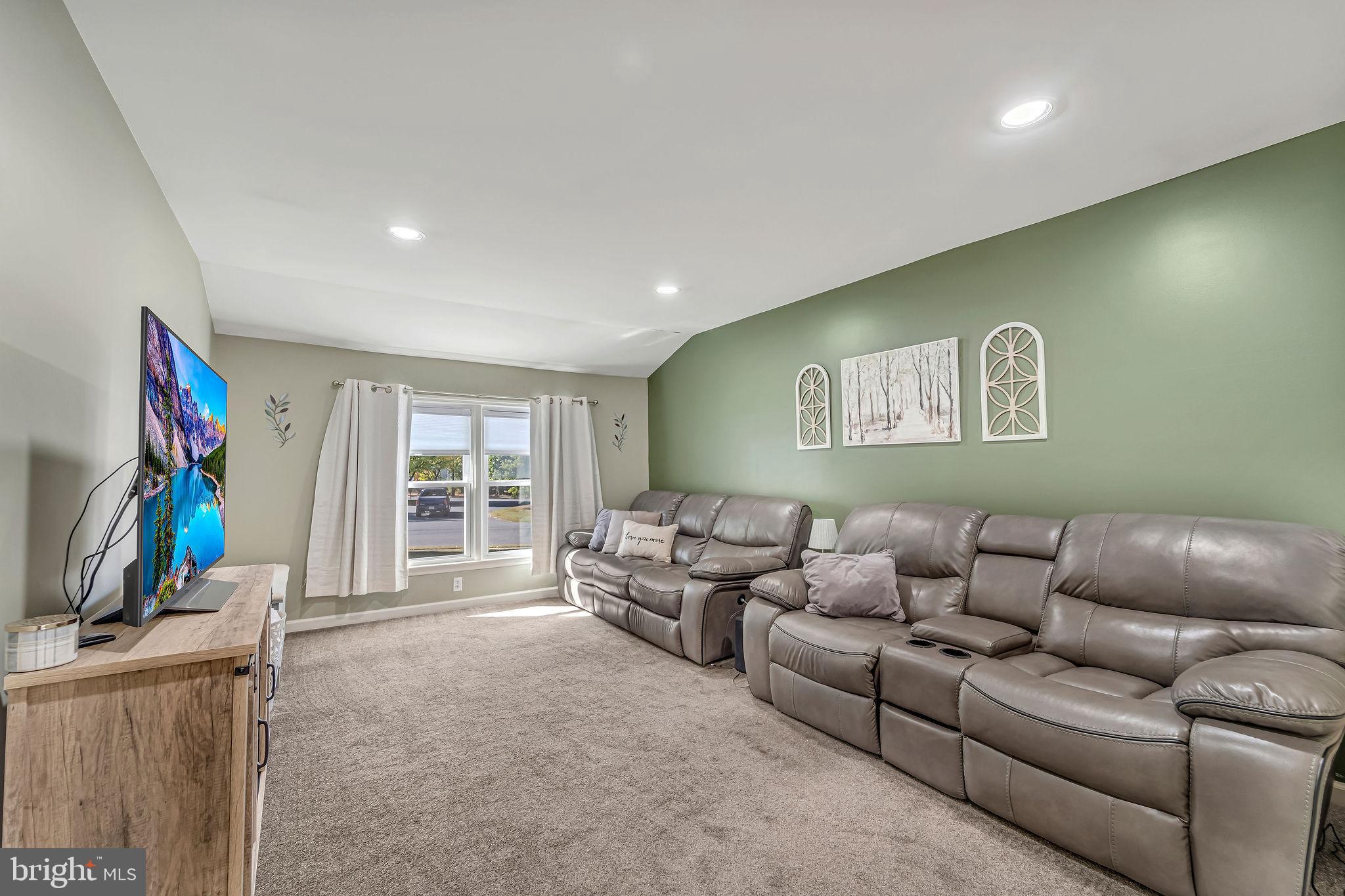 301 North Coles Avenue Maple Shade, NJ 08052 - Photo 18 of 31 a living room with furniture and a flat screen tv