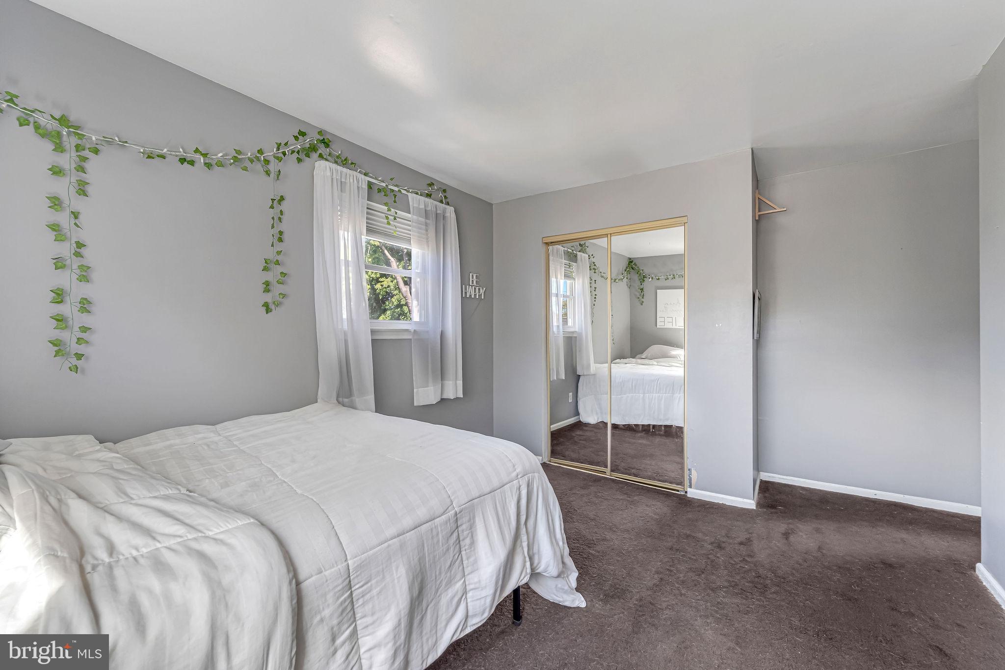 301 North Coles Avenue Maple Shade, NJ 08052 - Photo 22 of 31 a bedroom with a large bed and a window
