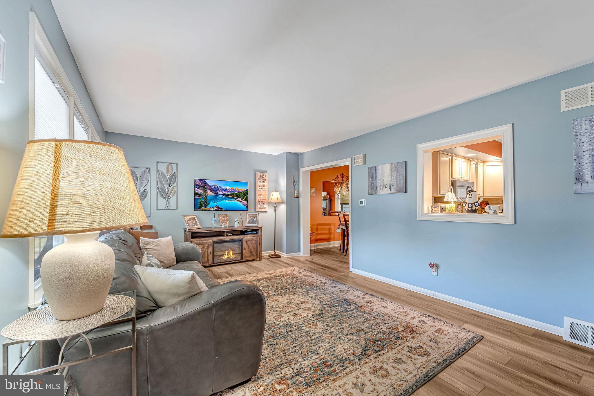 301 North Coles Avenue Maple Shade, NJ 08052 - Photo 8 of 31 a living room with furniture and a rug
