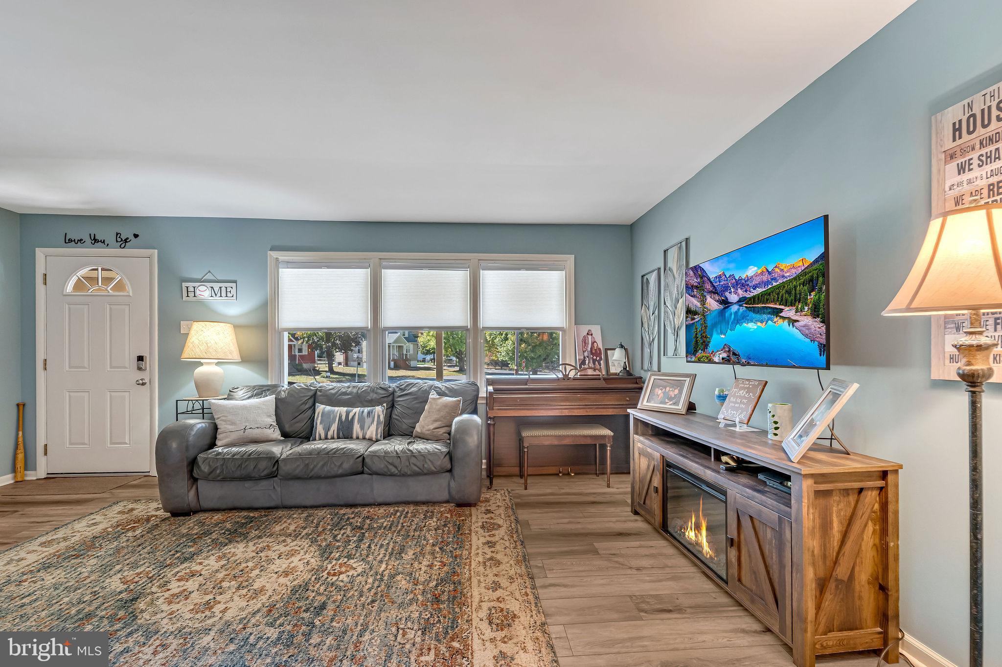 301 North Coles Avenue Maple Shade, NJ 08052 - Photo 9 of 31 a living room with furniture and a flat screen tv