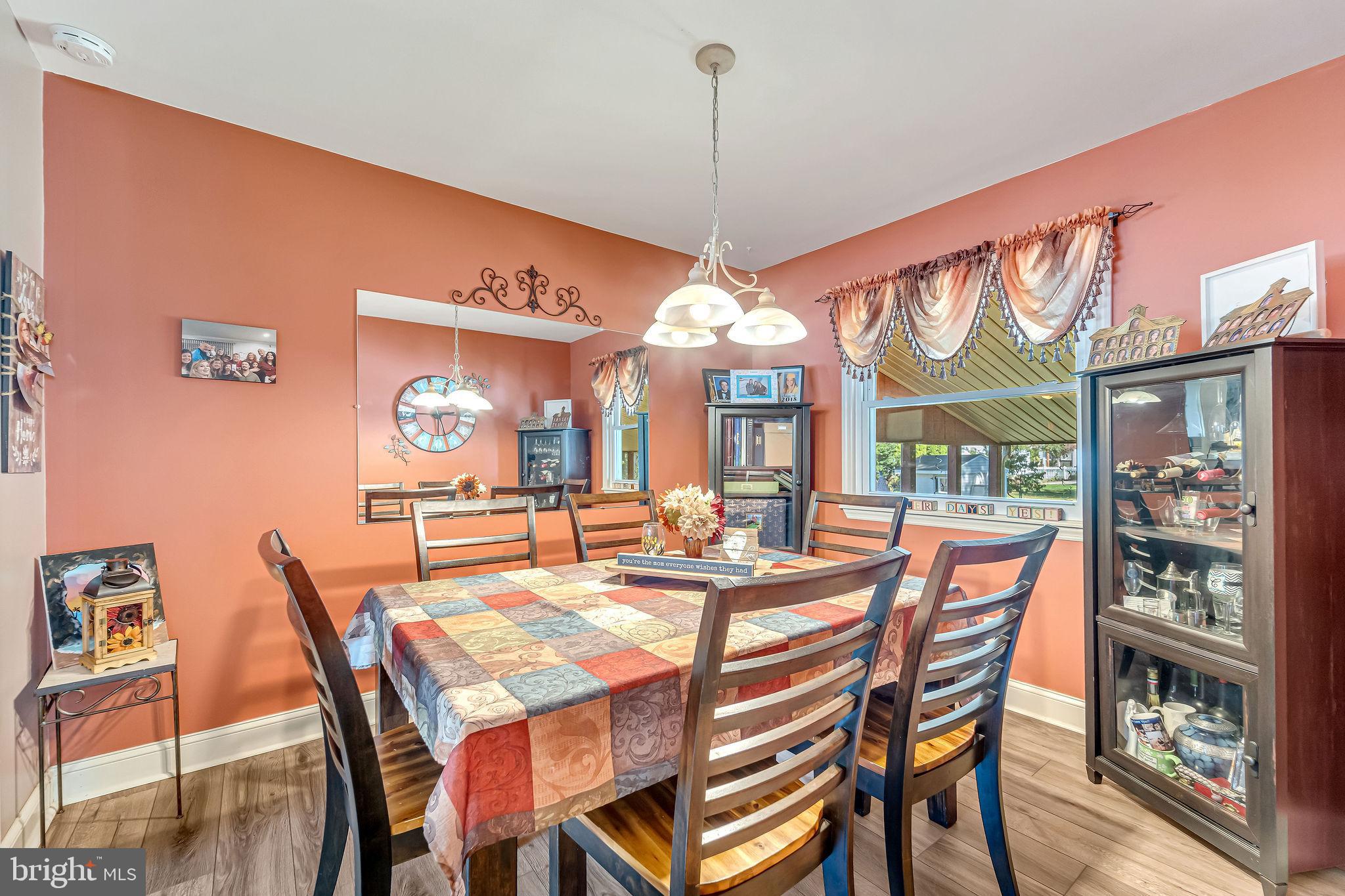 301 North Coles Avenue Maple Shade, NJ 08052 - Photo 10 of 31 a view of a dining room with furniture window and wooden floor