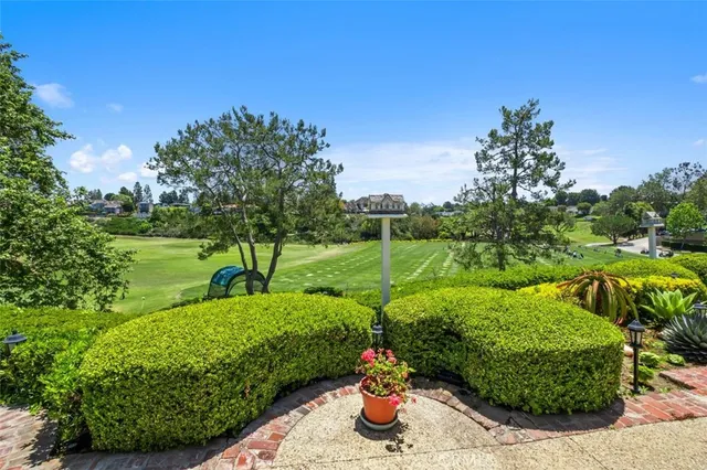 a view of a garden with a flower garden