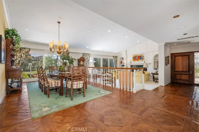 a view of a living room and dining room