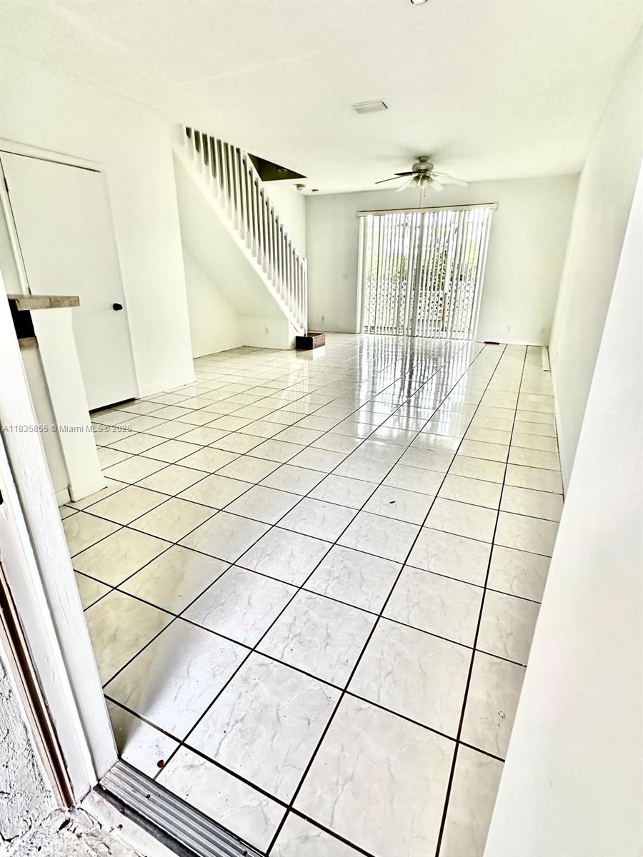 The Ridges Weston, FL 33331 - Photo 11 of 54 a view of entryway with wooden floor