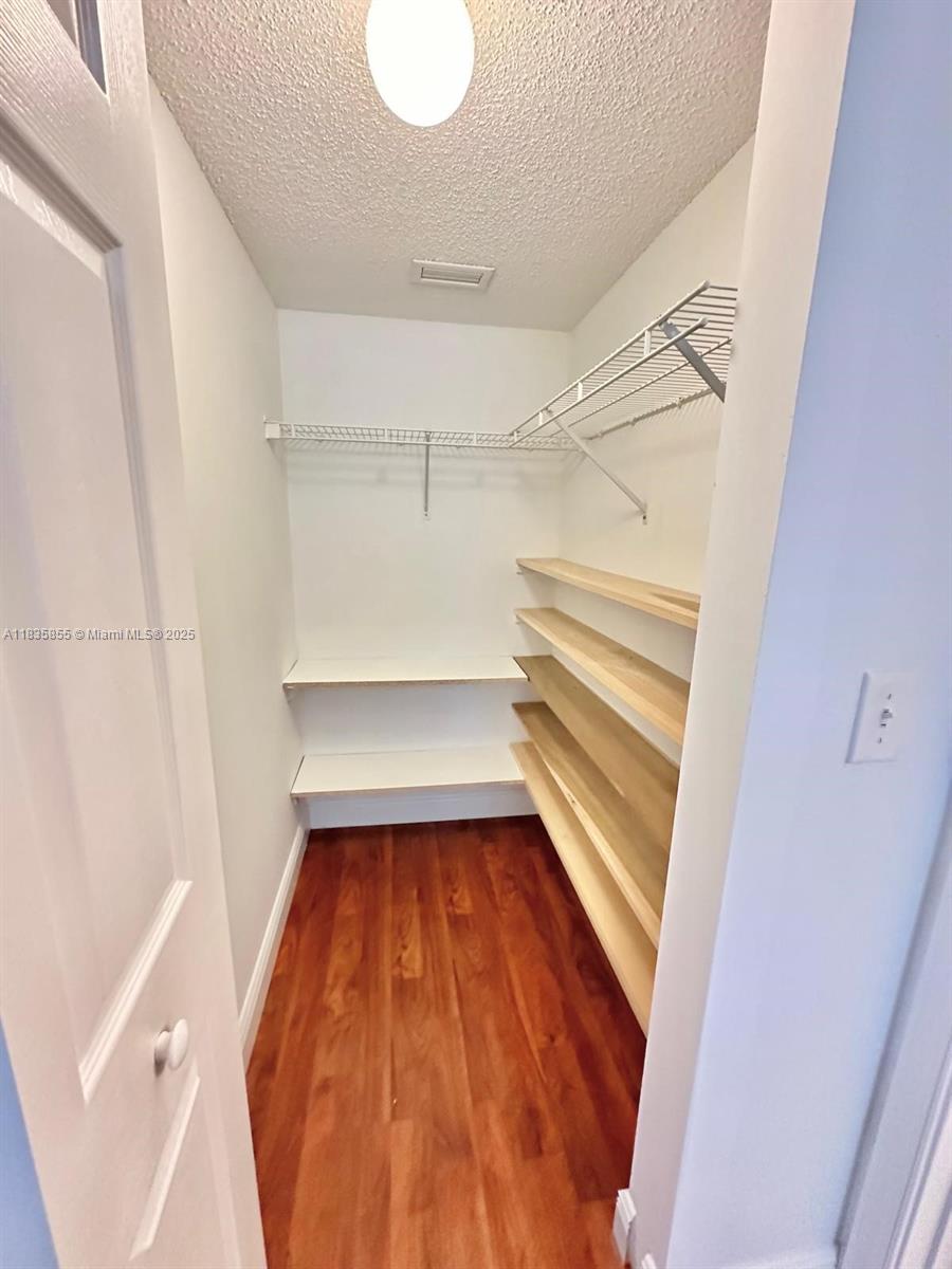 The Ridges Weston, FL 33331 - Photo 34 of 54 a view of an empty walk in closet