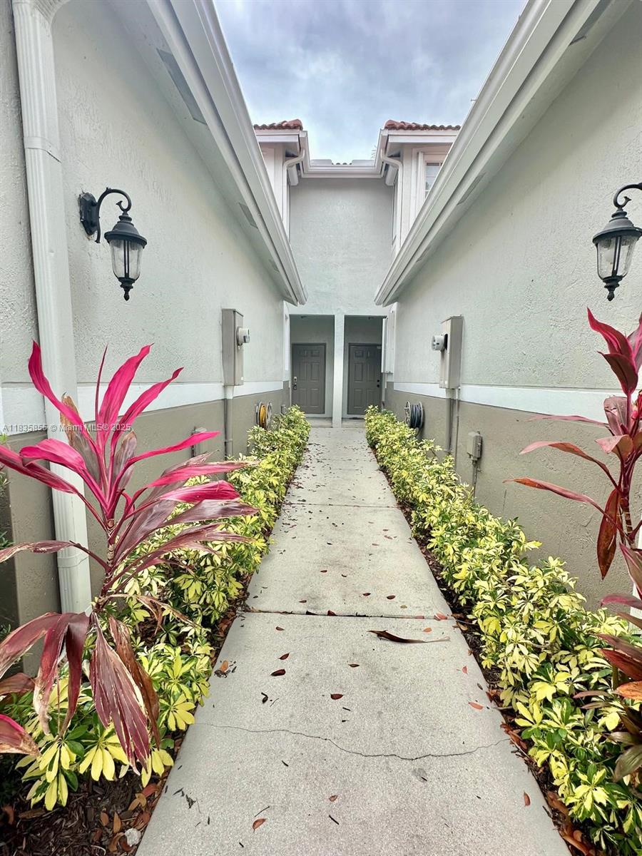 The Ridges Weston, FL 33331 - Photo 5 of 54 a front view of a house with garden