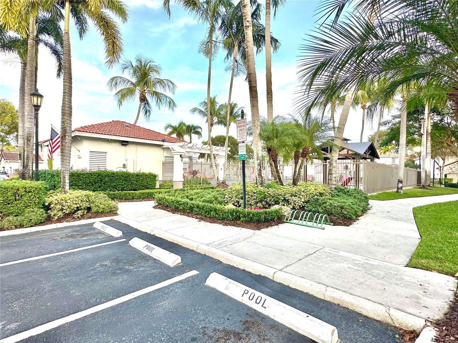 The Ridges Weston, FL 33331 - Photo 52 of 54 a view of a garden with palm trees