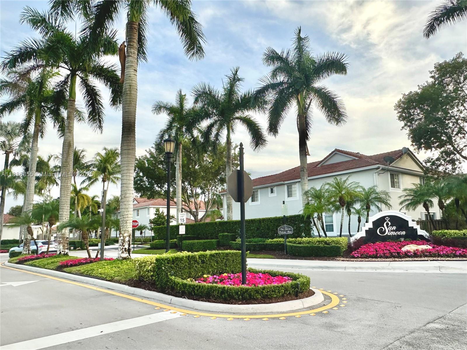 The Ridges Weston, FL 33331 - Photo 54 of 54 a white house with palm trees in front of it