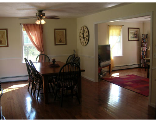 163 Prince Road Southbridge, MA 01550 - Photo 4 of 11 a view of a dining room with furniture and wooden floor