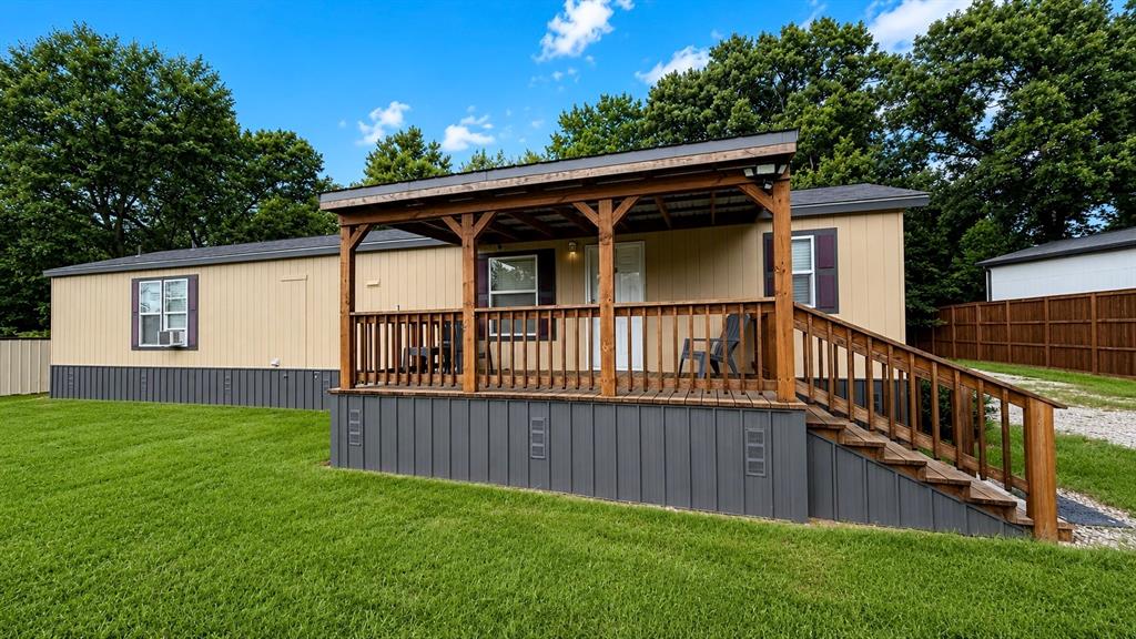 741 Waterfront Row Quitman, TX 75783 - Photo 2 of 40 a view of backyard with deck and deck