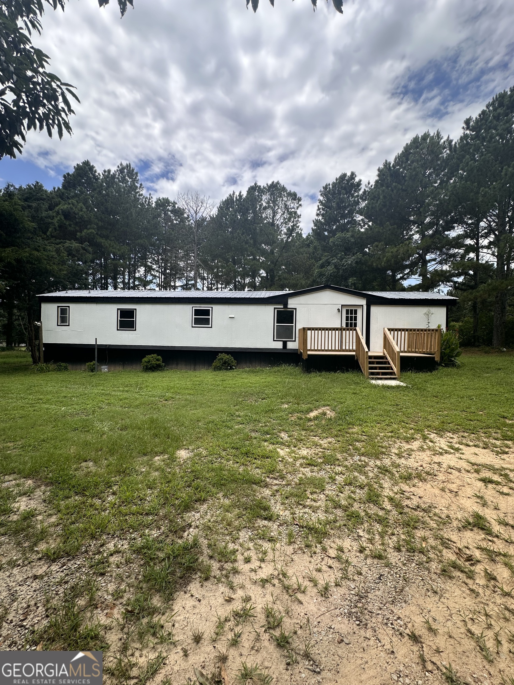 2023 Stephens Road Elberton, GA 30635 - Photo 11 of 21 a view of a house with a big yard