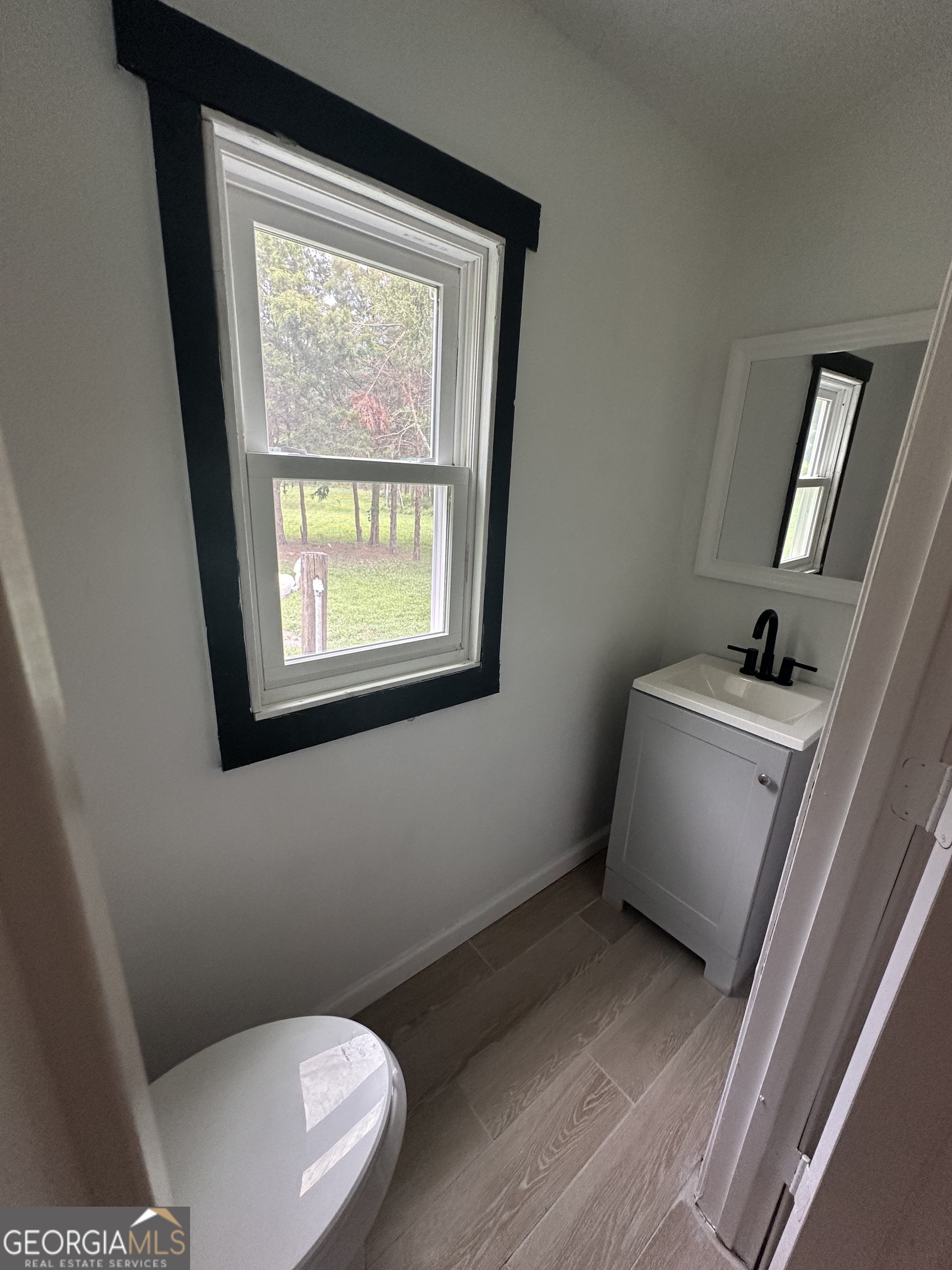 2023 Stephens Road Elberton, GA 30635 - Photo 15 of 21 a bathroom with a toilet and a sink