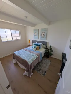 a kitchen with a sink appliances and cabinets