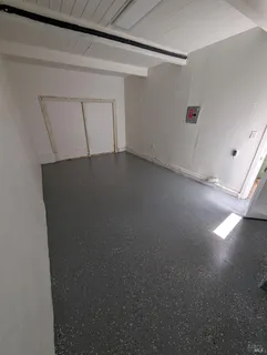 a utility room with washer and dryer