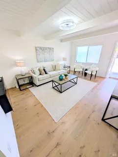 a kitchen with a sink cabinets and appliances