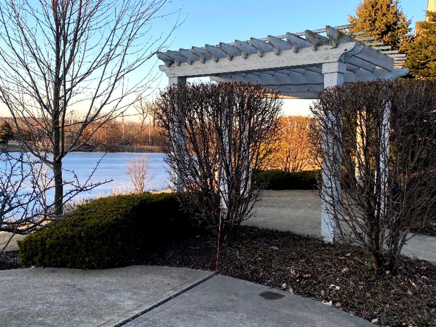 4425 Timber Ridge Court, Unit 4425 Joliet, IL 60431 - Photo 22 of 25 a view of a house with a tree