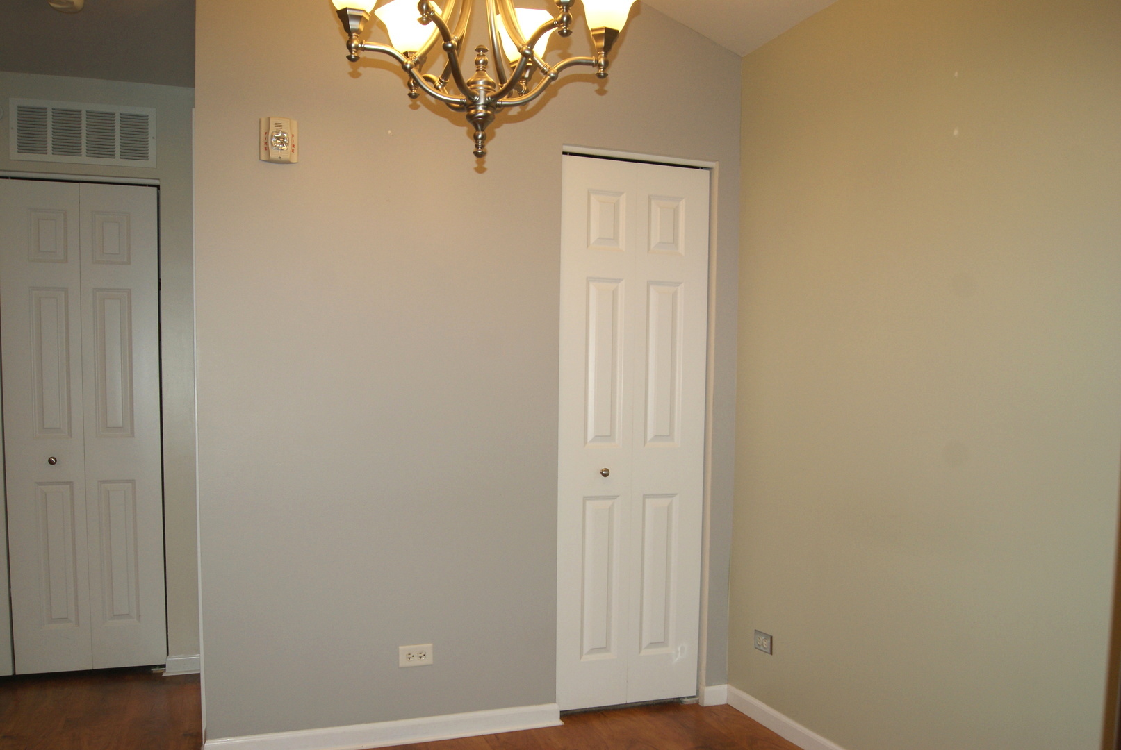 4425 Timber Ridge Court, Unit 4425 Joliet, IL 60431 - Photo 4 of 25 a view of a small space with wooden floor and a window