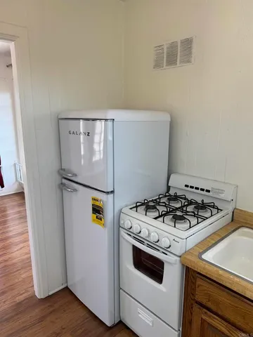 a utility room with washer and dryer