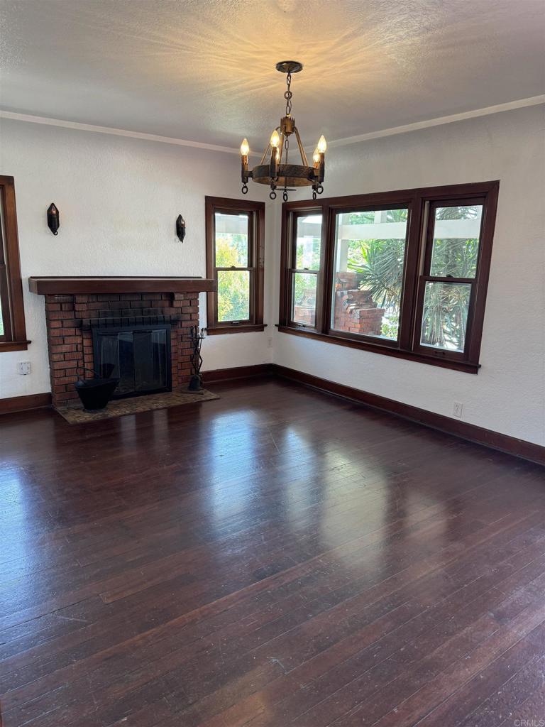 2805 State Street San Diego, CA 92103 - Photo 4 of 14 a view of an empty room with wooden floor and a window