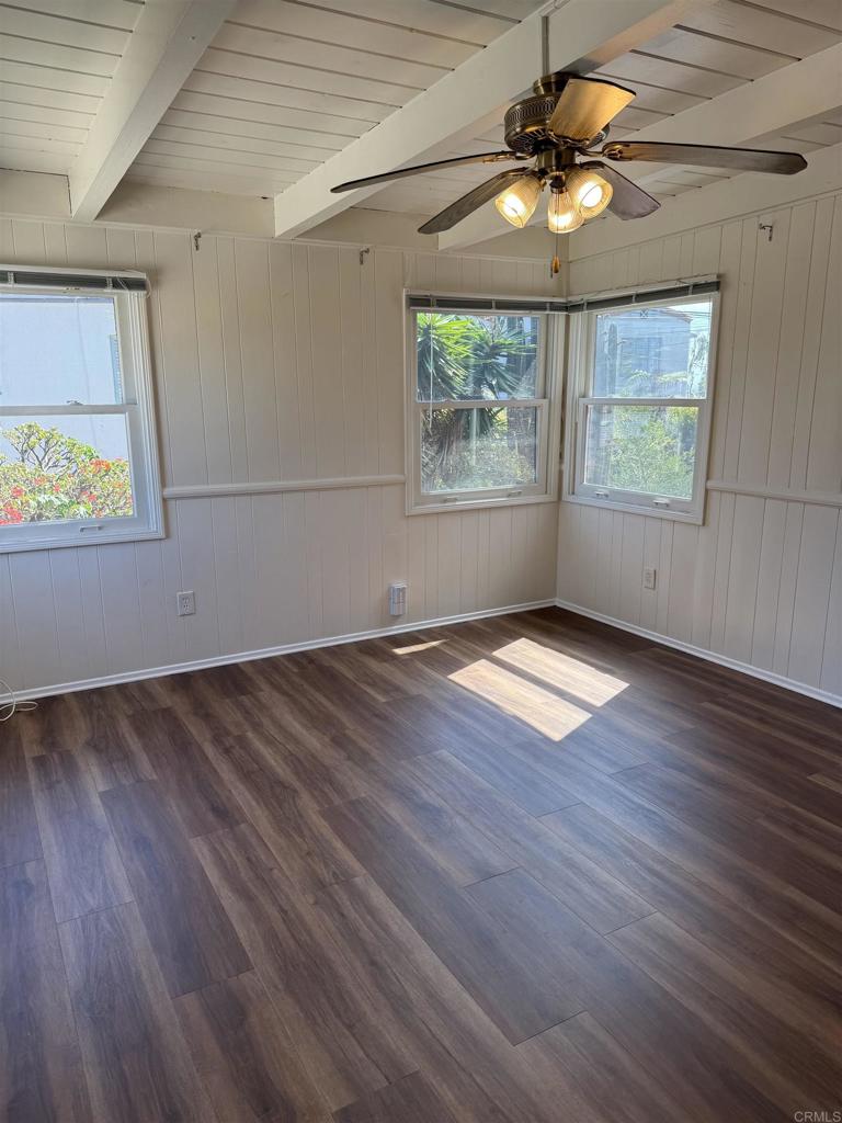 2805 State Street San Diego, CA 92103 - Photo 9 of 14 an empty room with wooden floor and windows