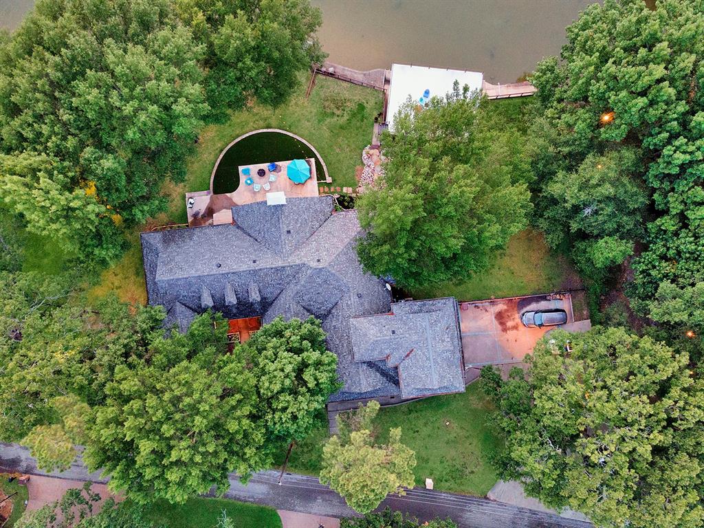 103 Glenn Road Mabank, TX 75156 - Photo 30 of 38 an aerial view of a house with a garden