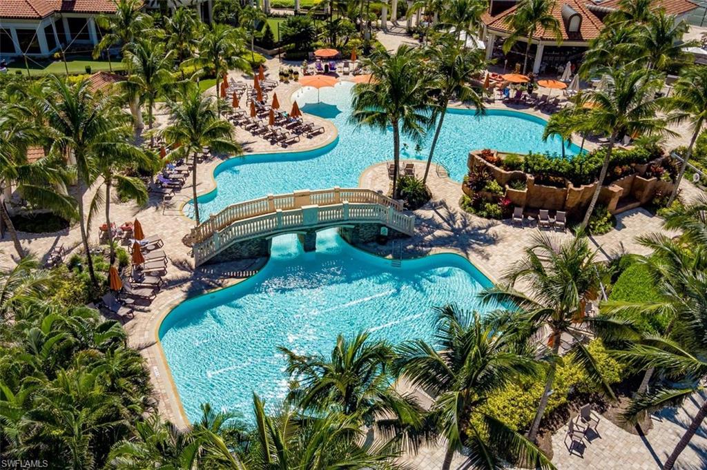 9596 Trevi Court, Unit 5431 Naples, FL 34113 - Photo 22 of 32 a backyard of a house with lots of green space