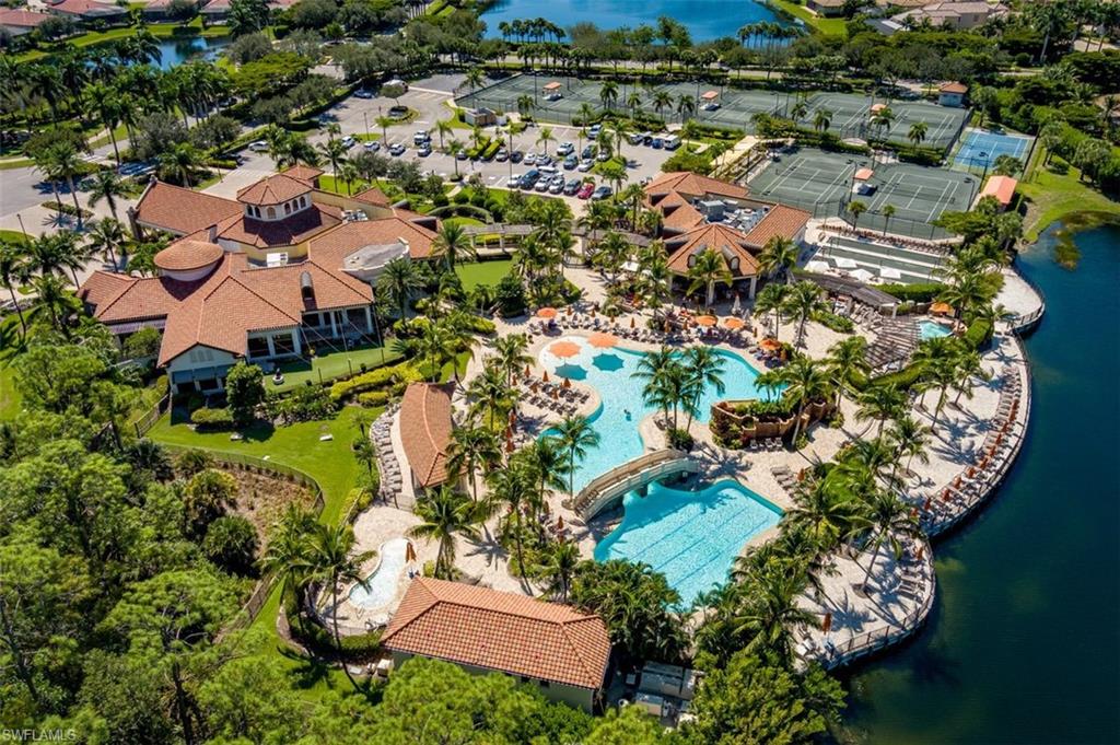 9596 Trevi Court, Unit 5431 Naples, FL 34113 - Photo 23 of 32 an aerial view of residential houses with outdoor space and street view