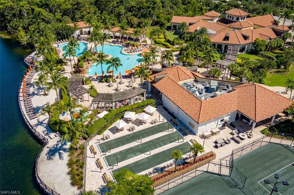 9596 Trevi Court, Unit 5431 Naples, FL 34113 - Photo 24 of 32 an aerial view of a house with a garden and plants