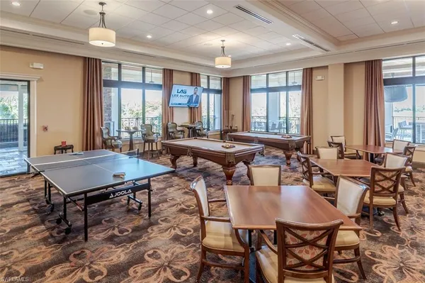 a dining room with furniture window and outdoor view