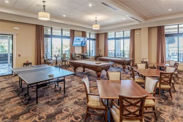 a dining room with furniture window and outdoor view