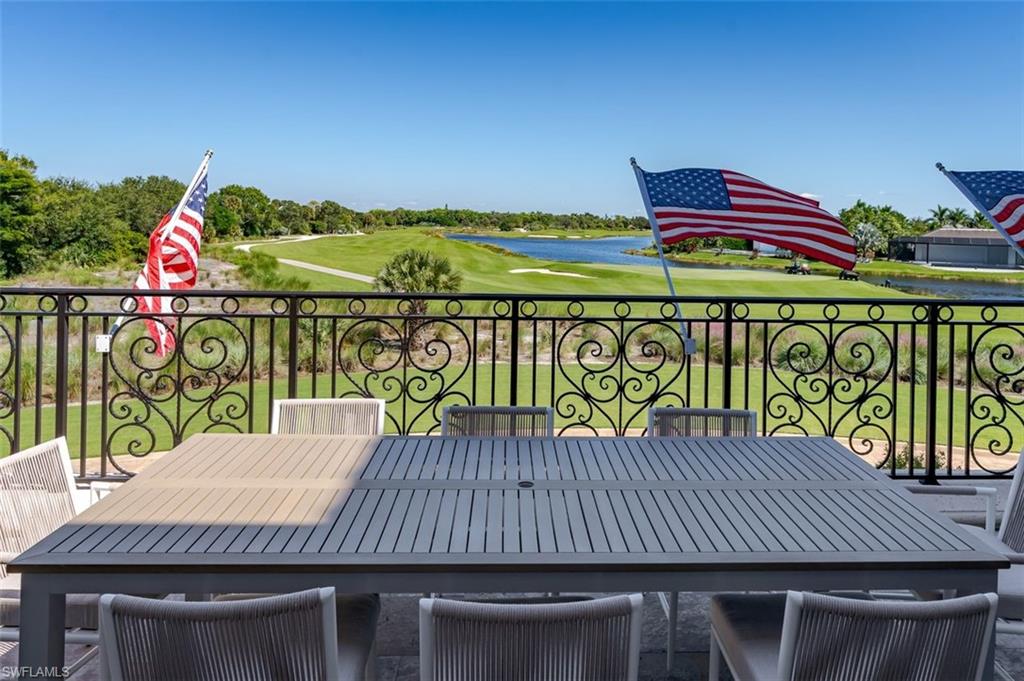 9596 Trevi Court, Unit 5431 Naples, FL 34113 - Photo 28 of 32 a view of outdoor kitchen with seating space